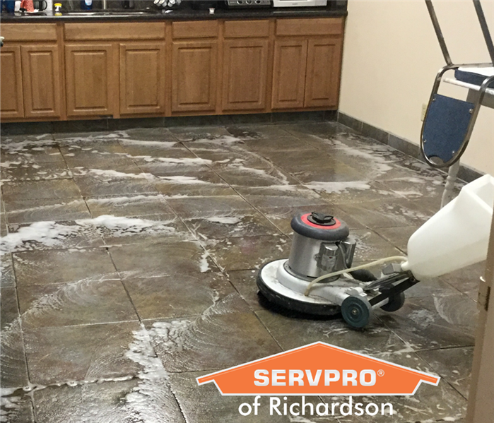 washing gray commercial tile floor