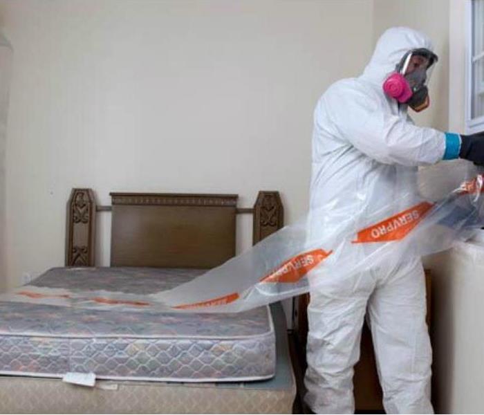 SERVPRO worker dress in biohazard PPE